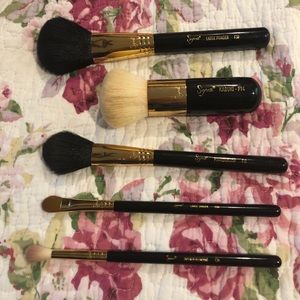 Sigma Black + 18k gold brushes, cleaners, and spa